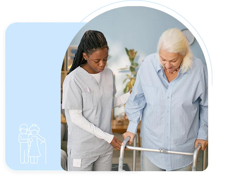 Caregiver in scrubs assisting an elderly woman using a walker indoors