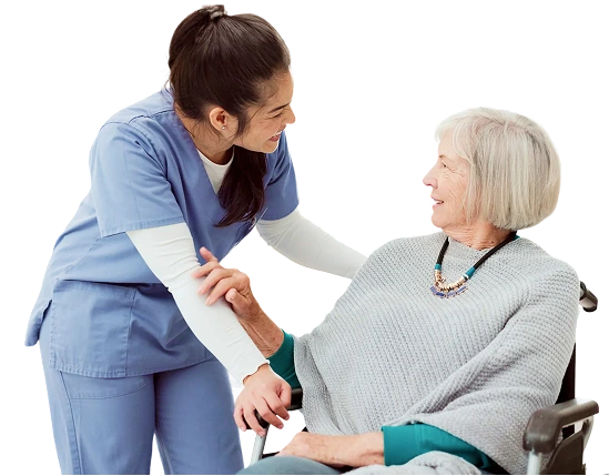 Compassionate home caregiver assisting senior woman in wheelchair during in-home care visit