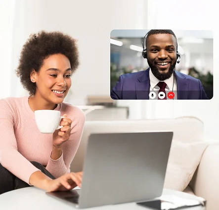 мWoman having a video call with a male consultant on a laptop